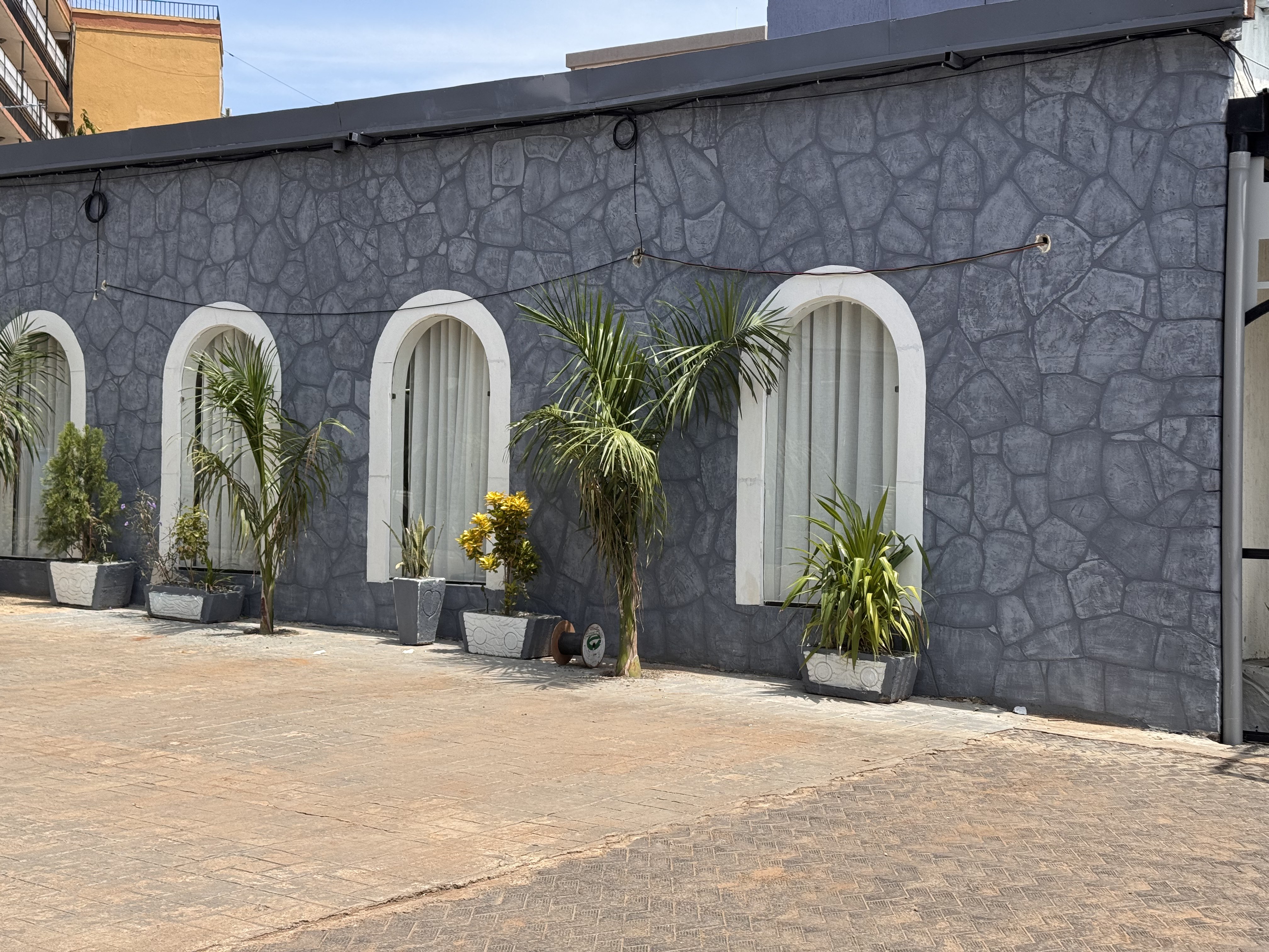 Exterior arches and stone facade